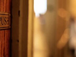 Push Commuters moving through station entrance Stock Footage