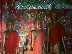 ZO Colored glass mosaics in the Royal Funerary Chariot Hall, Wat Sieng Thong temple / Luang Prabang, Laos Stock Footage
