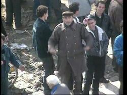 ALBANIA: HOLDING COMPANY OFFERS SOME MONEY BACK TO SMALL INVESTORS News Clip