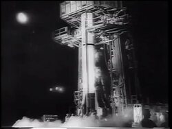 B/W 1961 Mercury 3 rocket on launch pad at night / Alan Shepard's flight - first American in space Stock Footage
