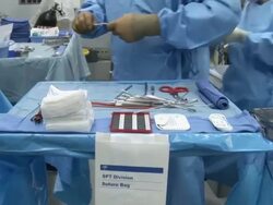 MS ZI  Doctor preparing for surgery  /  Little Rock, Arkansas, USA Stock Footage