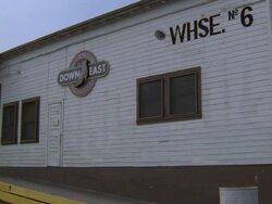 WS ZI View of white wood bulinding of Downeast Quality Footwear / California, United States Stock Footage