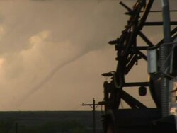 MS Shot of truck passing in front of snake tornado Texas / Texas, United States Stock Footage