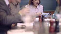 MS TU Businesswoman holding digital tablet and giving presentation Stock Footage