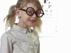 HD: Little Girl Wearing Funny Glasses Stock Footage