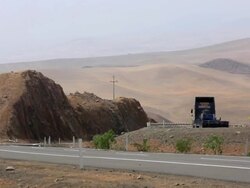 WS Shot of car running on road / South Of Peru, Nazca, Peru Stock Footage