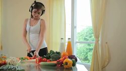 Woman standing with listening music Stock Footage
