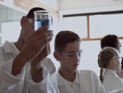 MS Classmates working alongside each other in school lab Stock Footage