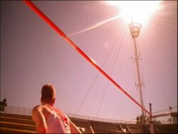 MS man jumping over high jump, clears bar, Australia Stock Footage