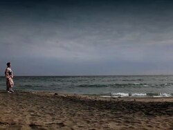 Japanese woman walking by the sea Stock Footage