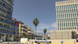 CLEAN : Cubans raise flags near US embassy ahead of Kerry visit News Clip