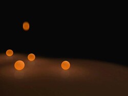 Luminous particles falling Stock Footage