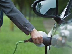 HD: Plugging The Car Into A Charging Station Stock Footage