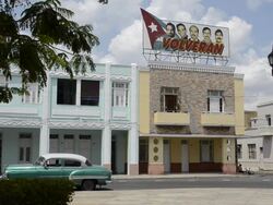 Poster of five Cuban heros in center of town of Cienfuegos Cuba Stock Footage