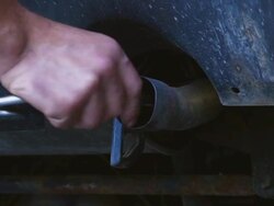 Emission Inspection In Auto Repair Shop (4K/UHD to HD) Stock Footage