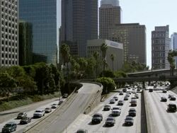 Static slow motion view of traffic on the freeway from bridge in Los Angeles. Stock Footage