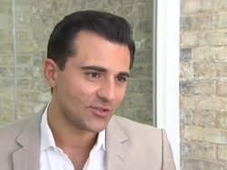 INTERVIEW - Darius Campbell on his approach to relationships, his parents overcoming cancer, how cancer has become so common at 'From Here To Eternity' Interview Stock Footage