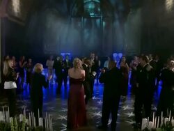 TILT UP Bride and groom and wedding party dance in center of ring of clapping guests Stock Footage