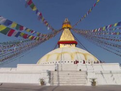 WS Monks and tourists walking at dome of Boudhanath stupa / Kathmandu, Central, Nepal Stock Footage