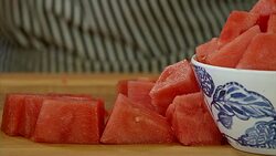 Watermelon on kitchen counter Stock Footage