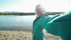 Personal perspective of woman by the lake Stock Footage