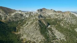 Aerial approach to Whitecliff Peak in the Carson Iceberg Wilderness, California. Stock Footage