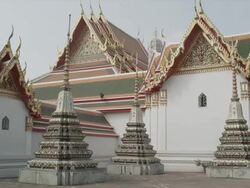 WS PAN pagodas and temples in Wat Pho, RED R3D 4K Stock Footage