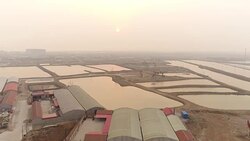 Aerial View of Oil Filed & Air Pollution In China Stock Footage