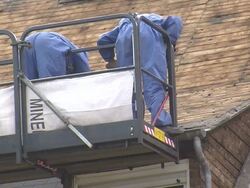 MS Housebreakers removing asphalt roof / Saarburg, Rhineland-Palatinate, Germany Stock Footage