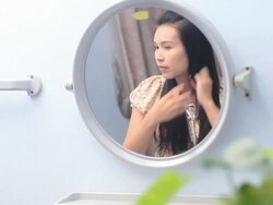 Woman in the mirror. Stock Footage