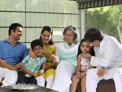 Family sitting on a couch  Stock Footage