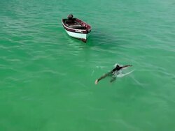 MS View of Two boys swimming at beach near Santa Maria / Santa Maria, Sal, Cape Verde Stock Footage