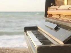 old piano on the coast Stock Footage