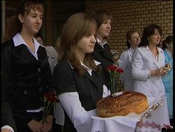 Returning space travellers greeted with bread and red noses News Clip