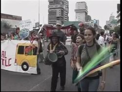 Thousands in protest against free trade pact News Clip