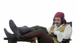 Relaxed pirate using digital tablet. Stock Footage