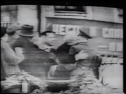 B/W 1961 Yuri Gagarin + Nikita Khrushchev hugging + shaking hands after Yuri's space flight / TV Stock Footage