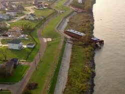 Sept. 12, 2005 aerial barges thrown onto shore of Mississippi in wake of hurricane / New Orleans Stock Footage