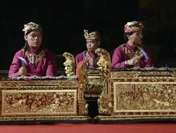 MS Gamelan musicians are playing traditional balinese Gamelan orchestra in Puri Saraswati temple AUDIO / Ubud, Bali, Indonesia, Asia Stock Footage