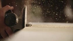 White Carpenter Routers a Piece of Wood Stock Footage