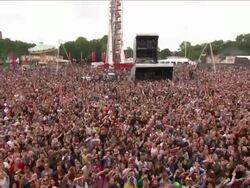 W/S EXT Concert Crowd Festival Day Waving Hands Stock Footage