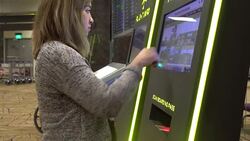 Asian woman at airport terminal, Singapore. Stock Footage