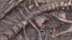 Archaeologists excavating 16th century burial site discovered during Crossrail construction News Clip