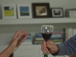 CU  off couple toasting with wine glasses Stock Footage