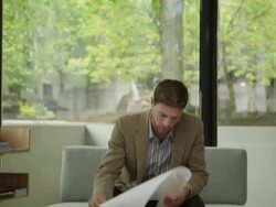 MS TD Young architect reviewing building plans / Portland, Oregon, USA Stock Footage