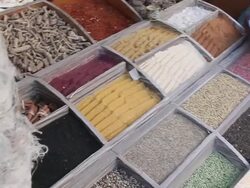 MS PAN Shot of Selection of spices in wooden boxes / Aswan, Egypt  Stock Footage