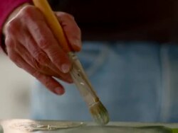 CU TU Man mixing paint on table / Hudson, New York, United States Stock Footage