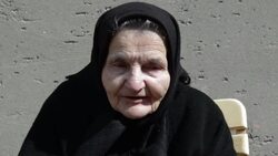 Elderly woman drinking a coffee. Stock Footage
