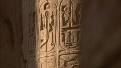 Sunlight illuminates Egyptian hieroglyphs on the walls of Karnak Temple. Stock Footage