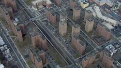 A Metro North train passes through housing projects in the Bronx. Stock Footage